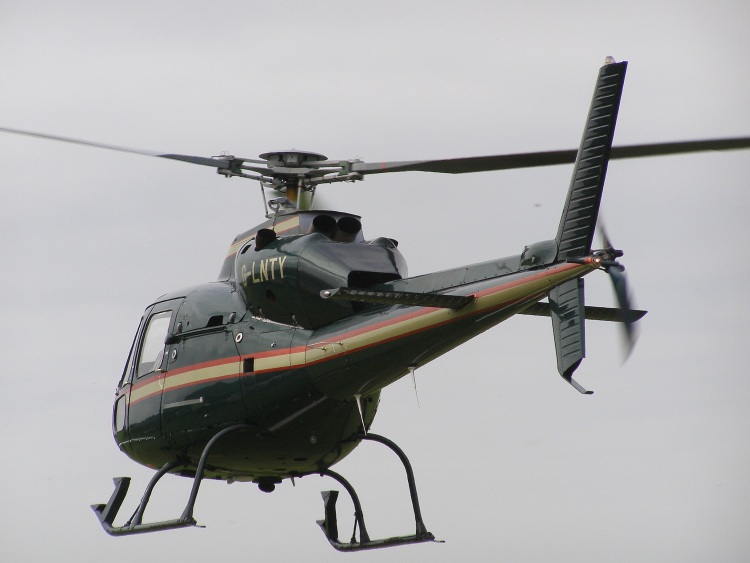 Twin Squirrel, G-LNTY, takes off from The Helicopter Museum's helipad