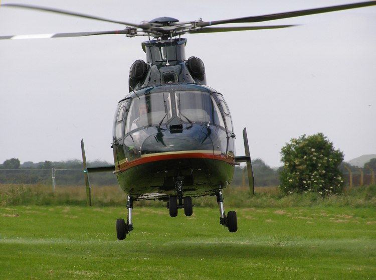 AS365N-2, G-MLTY, lands at The Helicopter Museum