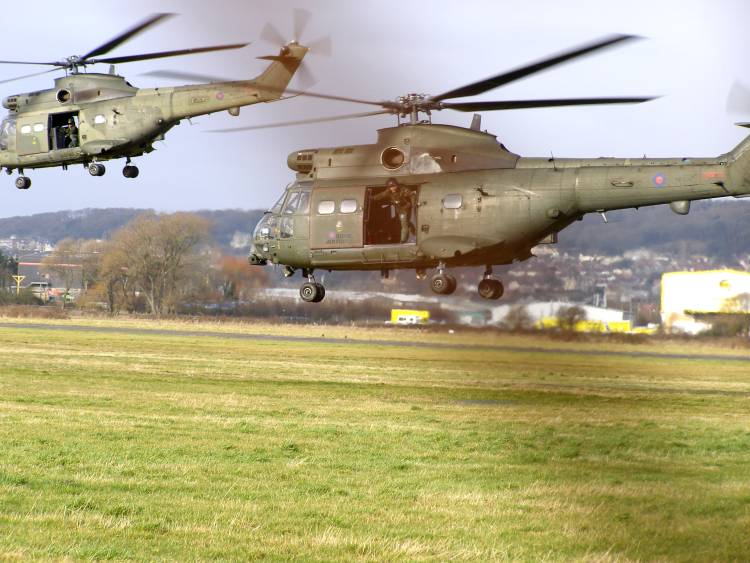Two RAF Puma HC1s take off from the disused Weston Airport on 21st January 2009