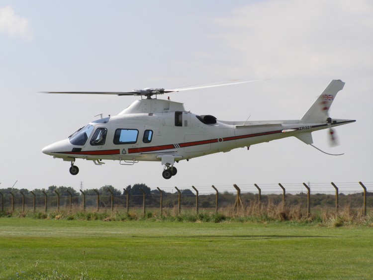 Agusta A109E, ZR321, departs The Museum