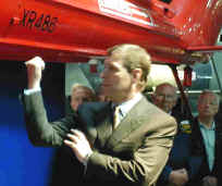 Prince Andrew points out the Queen;s Flight helicopters.