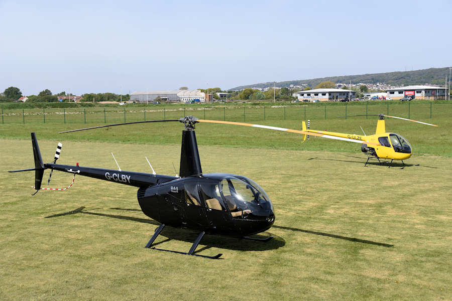 R44 G-CLBY and R22 G-ULZE helicopters at The Helicopter Museum